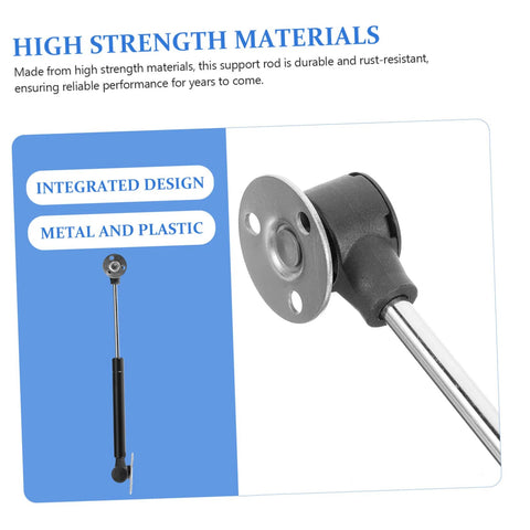 Gas spring hinge for cabinet doors; metal rod with black plastic housing and round mounting plate, close-up