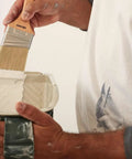 Painter using 2 Inch Shortcut Angle Sash Paintbrush Pack Of 3 With Purple Soft Grip Handle For Tight Spaces