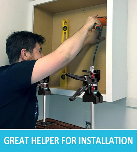 XKONE labor-saving arm jack pair; black lifting clamps with red springs mounted on a cabinet for panel lifting.