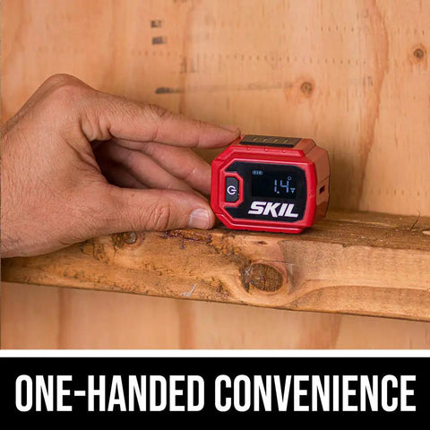 Compact Digital Level With Line Laser For Quick, Accurate Leveling Real Time Display And Easy Alignment Laser Line Projection On Walls Or Floors Built In Protractor Lightweight And Handy For Tight Spots And On The Go Projects. red digital level on wood beam, one-handed use