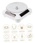 Solar Powered Rotating Display Turntable For Jewelry Phones And Accessories Lightweight Compact Electric Showcase Stand with clear top view.