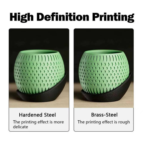 Two green 3D-printed lattice spheres on black bases, side-by-side, showing Hardened Steel vs Brass-Steel printing.