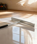 15.25 Inch Sheet Metal Bender Tool For 24 Gauge Steel Folds with PVC handle laying on reflective surface