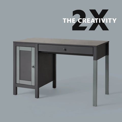 Black desk with drawer and side cabinet on gray background, text overlay '2X The Creativity'