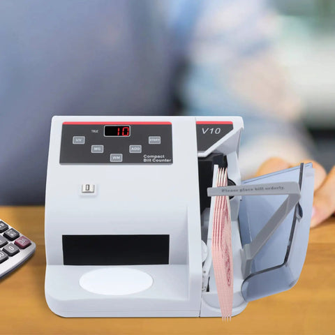 Portable Money Counter Machine With LED Display And Auxiliary Bracket Hands Free Operation, Fast 600 Bills Per Minute shown in use