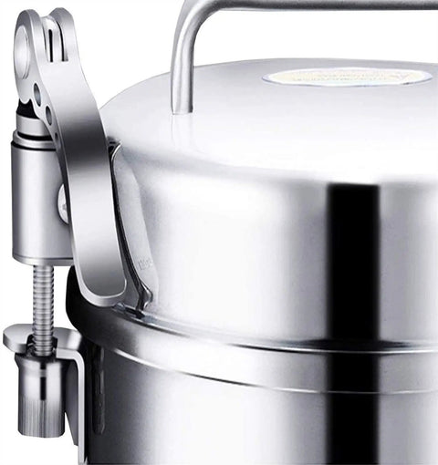 Close-up of a stainless steel electric grain grinder pulverizer lid, featuring latch mechanism for superfine flour and powder processing.