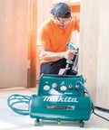 Built Tough One Point Five Horsepower Three Gallon Oil Free Electric Air Compressor Featuring Sixty Decibel Quiet Operation and Durable Roll Cage used for carpentry.