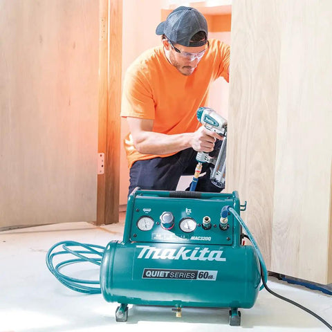 Built Tough One Point Five Horsepower Three Gallon Oil Free Electric Air Compressor Featuring Sixty Decibel Quiet Operation and Durable Roll Cage used for carpentry.