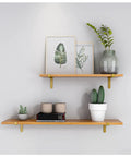 Premium Corner Shelf Brackets For Floating Wall Shelves and Rustic Industrial L Shape Supports with a sleek matte black finish holding wooden shelves.