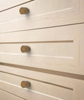 Antique Brass Round Cabinet Knobs 1.1 Inch Diameter Zinc Alloy With Brushed Finish on white dresser drawers
