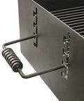 Close-up of Heavy Duty Park Style Charcoal BBQ Grill For Camping Backyard Patios And Tailgating with adjustable grate handles.