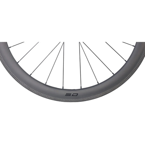 Close-up of 50mm Carbon Clincher Wheelset For 700C Road Bikes Tubeless Ready With Laser Brake Surface, side view showing rim and spokes