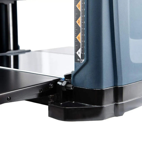 Close-up of Smooth As Glass 15 Amp Benchtop Thickness Planer features measuring guide and sturdy base for precision woodworking.