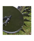 Close-up of 36 Inch Wide Lawn Aerator Roller With 78 Steel Spikes And 24 Gallon Water Holder, shown on grass, ideal for large yards.