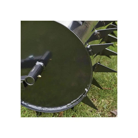 Close-up of 36 Inch Wide Lawn Aerator Roller With 78 Steel Spikes And 24 Gallon Water Holder, shown on grass, ideal for large yards.