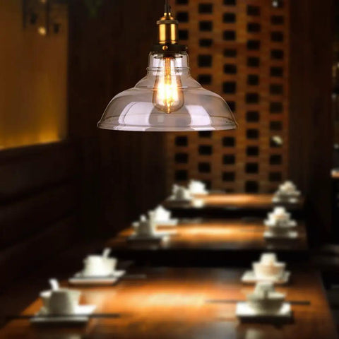 Vintage Edison Style LED Filament Bulb 40W Equivalent E26 Non Dimmable illuminating a stylish dining area