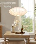Italian Silkworm Cocoon Pendant Light With White Faux Silk Drum Shade above dining table, 50 cm