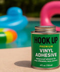 Can of vinyl adhesive by pool with inflatables, not "Go To Vinyl Cement Adhesive Heavy Duty Waterproof Fast Dry Bond For Pools Inflatables PVC Air Mattresses Boats Tarps Pipes Upholstery And More Ultra Strong Hold 32 OZ"
