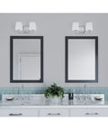 Glance Two-Light Bath Vanity Light In Brushed Nickel With Etched Linen Glass Shades over mirrors in a modern bathroom