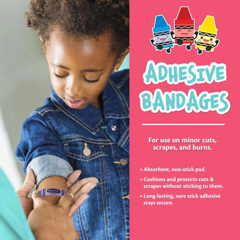 Crayola First Aid Kit, 30 pieces; child getting an adhesive bandage applied to forearm beside pink packaging.