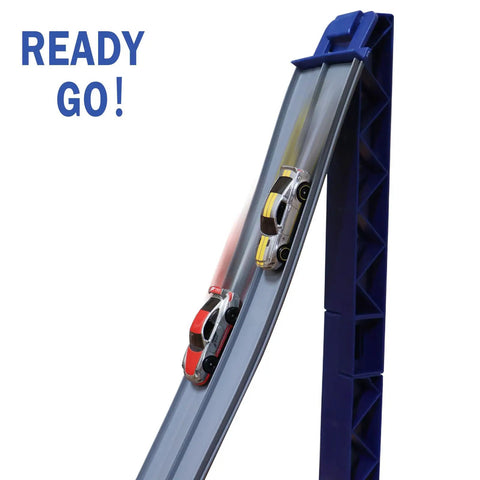 Flexible Dual Lane Race Track Set With U Turn Design for Kids, showing two diecast cars racing side by side down a slope.