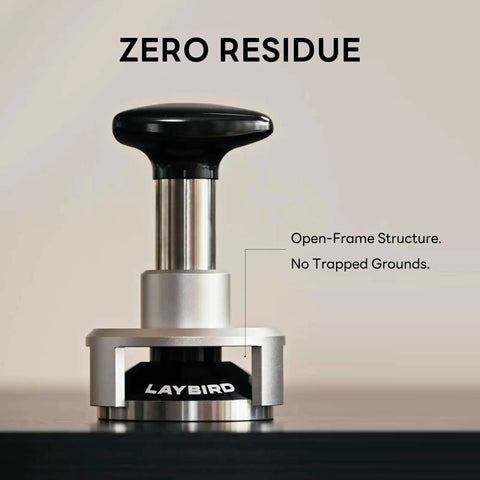 Pro Grade 58.5mm Espresso Tamper With 25Lb Constant Pressure Spring Loaded System, silver, side view laying flat