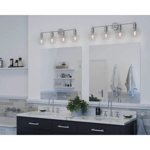 Hansford 4 Light Bath Vanity Fixture in Polished Nickel with Glass Globe Shades, shown above a modern master bathroom sink.