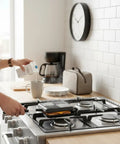 Elsjoy Stovetop Toasted Sandwich Maker Press on stove, aluminum flip pan in use for breakfast preparation, steaming sandwich.