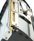 Close-up of 2 In 1 Mud Compound Putty Drywall Finishing Box Tool showing adjustable blade and pressure plate lid.