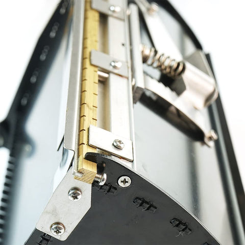 Close-up of 2 In 1 Mud Compound Putty Drywall Finishing Box Tool showing adjustable blade and pressure plate lid.