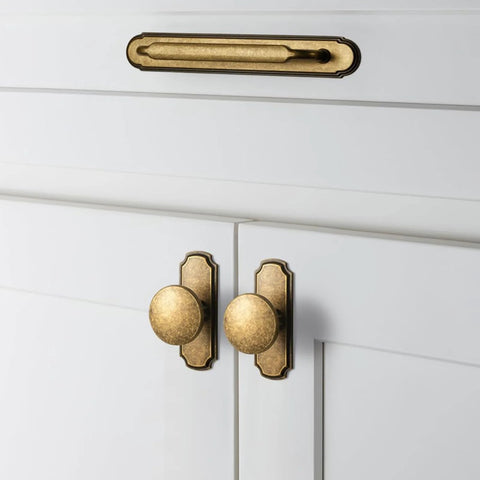 Front view of Antique Brass Cabinet Pulls With Backplate Spacer 2 Pack on white cabinets, zinc alloy durable corrosion resistant