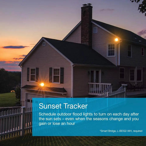 House with illuminated outdoor lights at sunset, demonstrating Smart Light Switch Three Way Kit With Pico Remote And Wall Plate And Wall Bracket For LED Lights And Fans On Off Only Neutral Required Five Amp Super Easy Setup For Indoor And Outdoor Living Spaces effect.