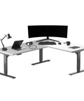 Level Up Electric Height Adjustable L Shaped Corner Standing Desk 78 X 48 Inch spacious home office setup with dual monitors.