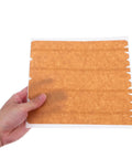 Hand holding Beefy Heavy Duty Packing Tape for Cardboard Boxes with High Adhesion and Easy Tear Strip on white background.