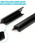 2 Pack Black Aluminum Alloy Modern Finger Pulls For Cabinets And Drawers 90mm with 76mm spacing showing rounded edge detail.