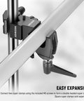 NEEWER camera clamp with 5/8 in stud and spring lock, installed on a metal bar for photography and lighting mounting.