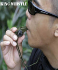 Person using 3 In 1 Emergency Survival Gear Whistle Compass Thermometer With Lanyard For Outdoor Camping And Hiking Waterproof And Durable