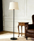 4 Pack Straight Pipe Lamp Stems With M10 Threads And Connectors 7.87 Inch Hollow Black Rods in stylish living room setup with floor lamp.