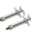 Two clear PC syringes, 20ml each, for 2x 20ml Brake Bleed Syringes For Liquid Brake Fluid Pro Grade PC Mineral Hydraulic Bike Bleed Kit For MTB And Road Brakes Easy Precise DIY Ready Maintenance Tool For Bike Repairs on white background.