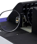 Eyeglass Frame Heater featuring 1500W Digital Display, showing lens slot and air vent for optical adjustments.