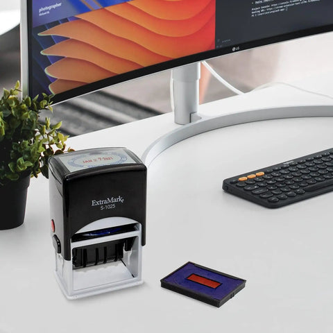 Slick Self Inking Office Date Stamp With Received Phrase And Dual Blue Red Ink for fast daily paperwork tasks on a desk.