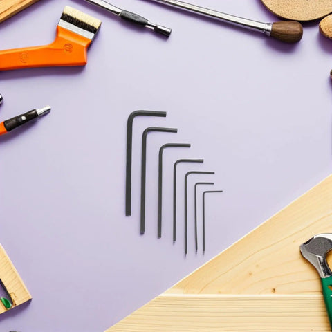 Top Notch 7 Piece Mini Metric Hex Key Wrench Set From 0.7 To 3.0mm Compact Metal Tool Kit arranged on purple background