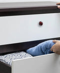 Dope Abstract Marble Textured Glass Drawer Pulls 4 Piece Set with screws on a white dresser drawer