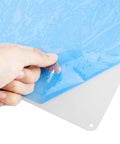 Hand peeling blue protective film from a Four Pack White Sign Blanks 14 X 10 Inches Hella Durable Rust Free Aluminum Metal Sheets.
