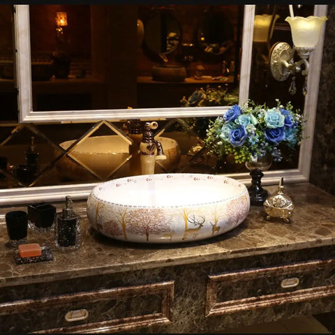 USZWBY Vessel Sinks Bathroom Vessel Sink Forest Art Countertop Basin on marble countertop with decorative items and flowers.
