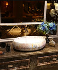 SDVantage Undermount Sink Bathroom Vessel Sink Forest Art Countertop Basin Nordic Ceramic Washbasin on a marble countertop.