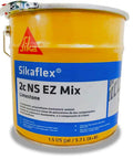 Pro Grade Two Component Polyurethane Elastomeric Sealant With No Fuss Easy Mix Formula For Heavy Duty Construction And Roadway Jobs Featuring Badass Adhesion And Flexible Performance In Classic Limestone Tint At One Point Five Gallons in yellow pail.