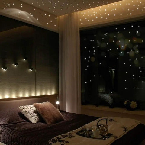 Bedroom with Glow In The Dark Wall Stickers Set With 407 Removable Luminous Dots for ceiling, creating nighttime glow ambiance.