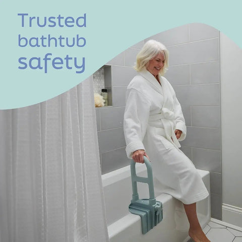 Heavy Duty Clamp On Bathtub Grab Bar Featuring Snap Fit Solid Steel Mounting Design Built To Lock Onto Standard Tub Edges Measuring 2.75 To 6.25 Inches For Reliable Everyday Bathroom Safety, mounted on tub with user in robe.