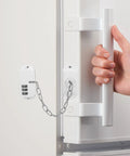 Kidproof Fridge Lock With Adjustable Password Code securing refrigerator door handle, adhesive mount visible, white color.